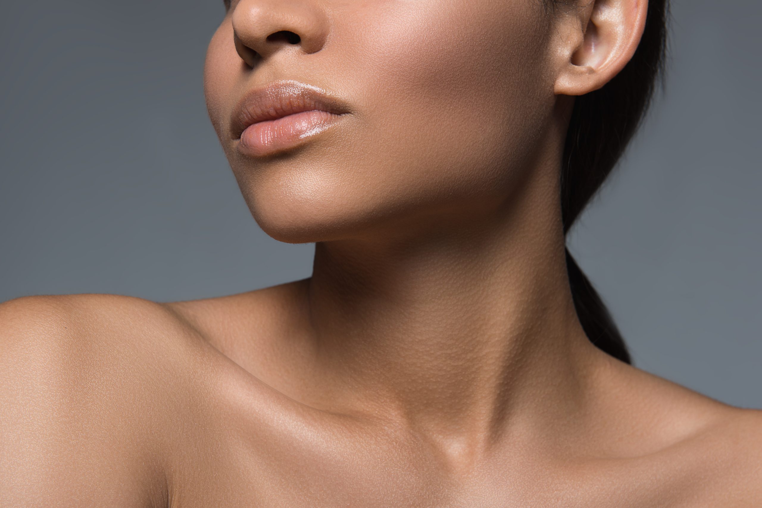 Girl having perfect clean derma Freshness concept. Close up of female appearance and neck. Her skin is groomed and young